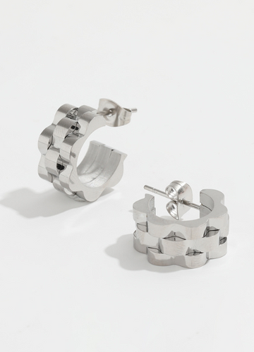 Bold silver plated chunky band earrings with a modern, statement hoop design.