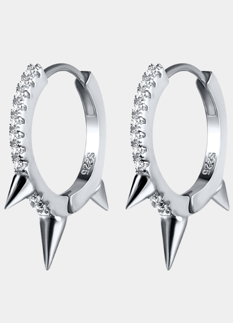 Petite huggie earrings with pavé zirconia and rivet detailing in polished 925 sterling silver, perfect for a sleek everyday look.