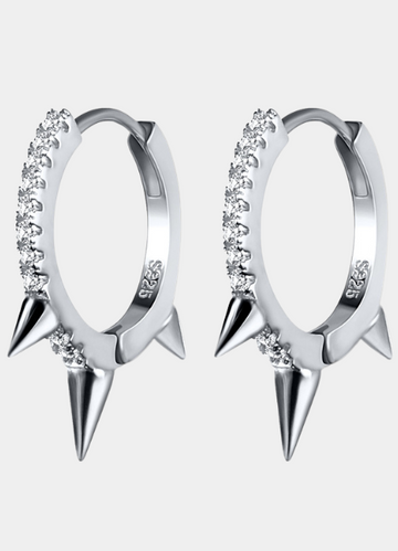 Petite huggie earrings with pavé zirconia and rivet detailing in polished 925 sterling silver, perfect for a sleek everyday look.