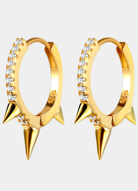 Petite huggie earrings with pavé zirconia and rivet detail, crafted in 925 sterling silver and 18K gold plating for a modern, elegant finish.